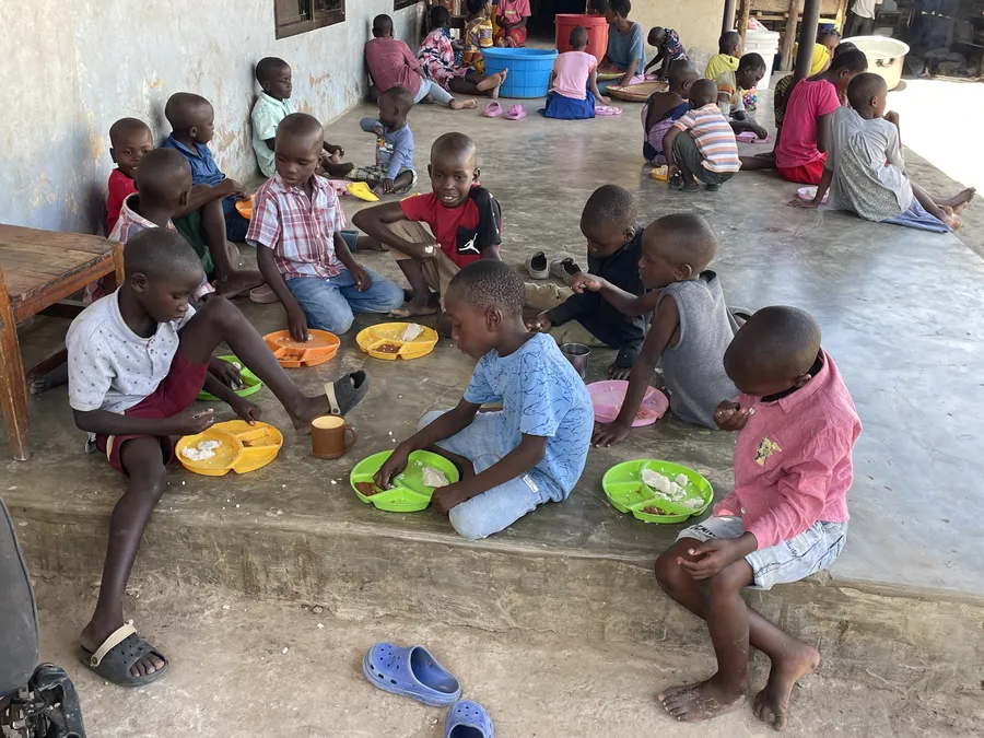 Lunch, eaten together on the floor at Watoto Wa Africa