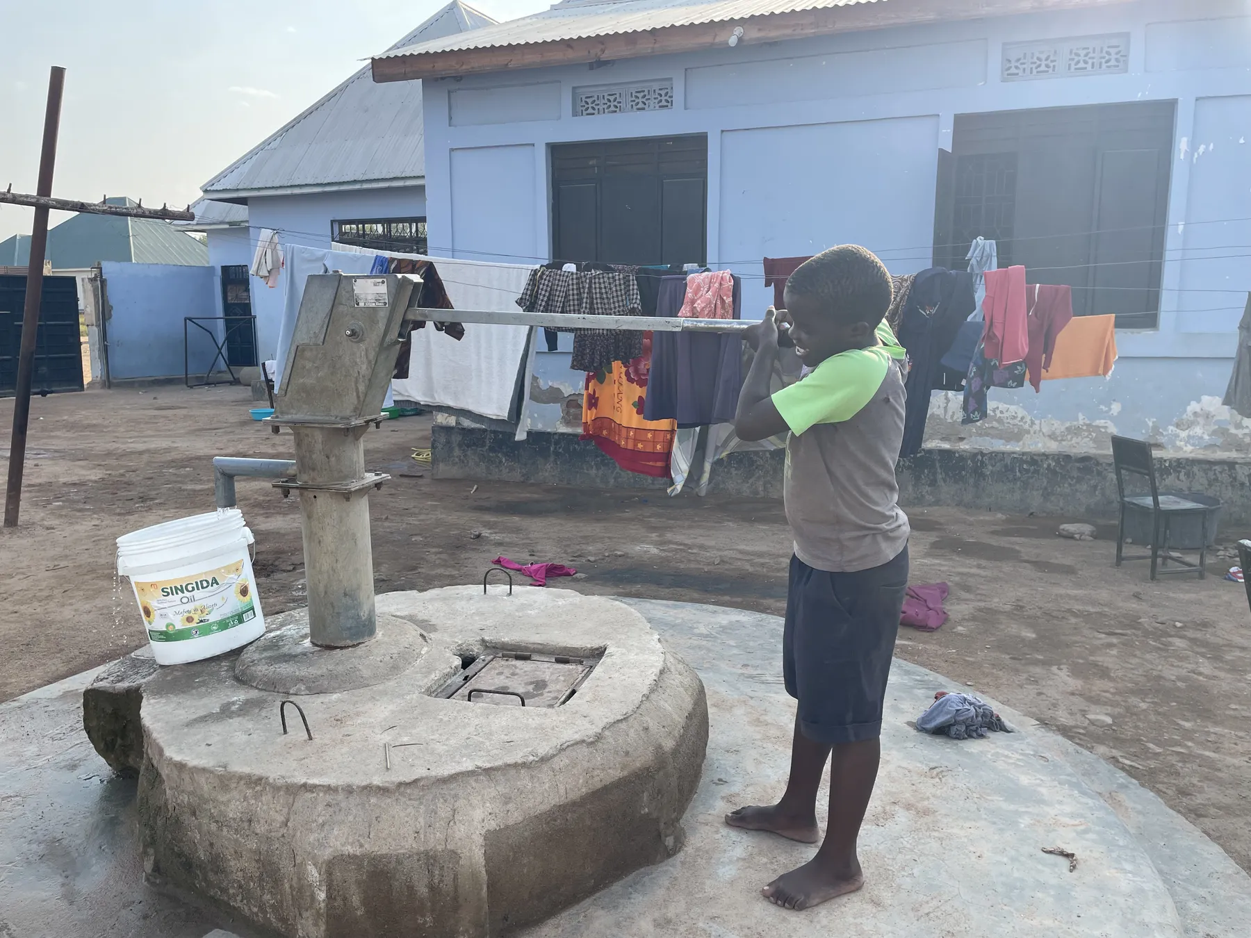Pumping water at Watoto Wa Africa