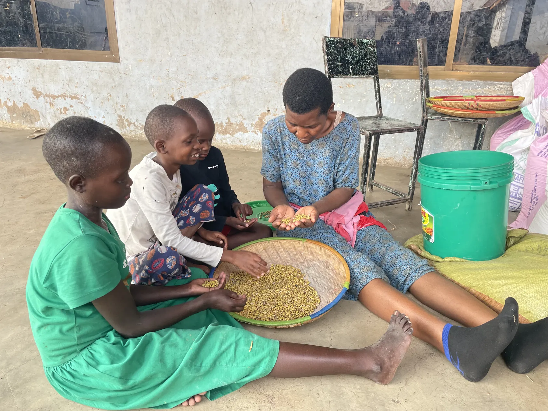 Sorting beans for dinner at Watoto Wa Africa