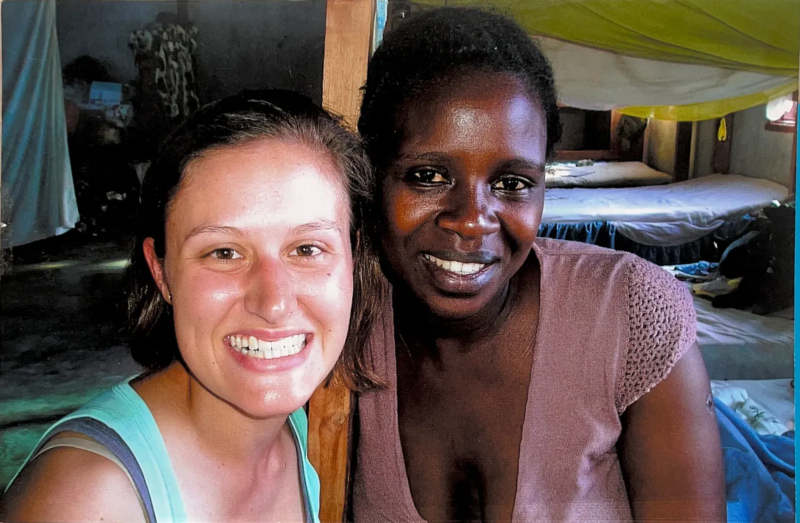 Volunteers and children at Watoto Wa Africa, from the home's earlier years