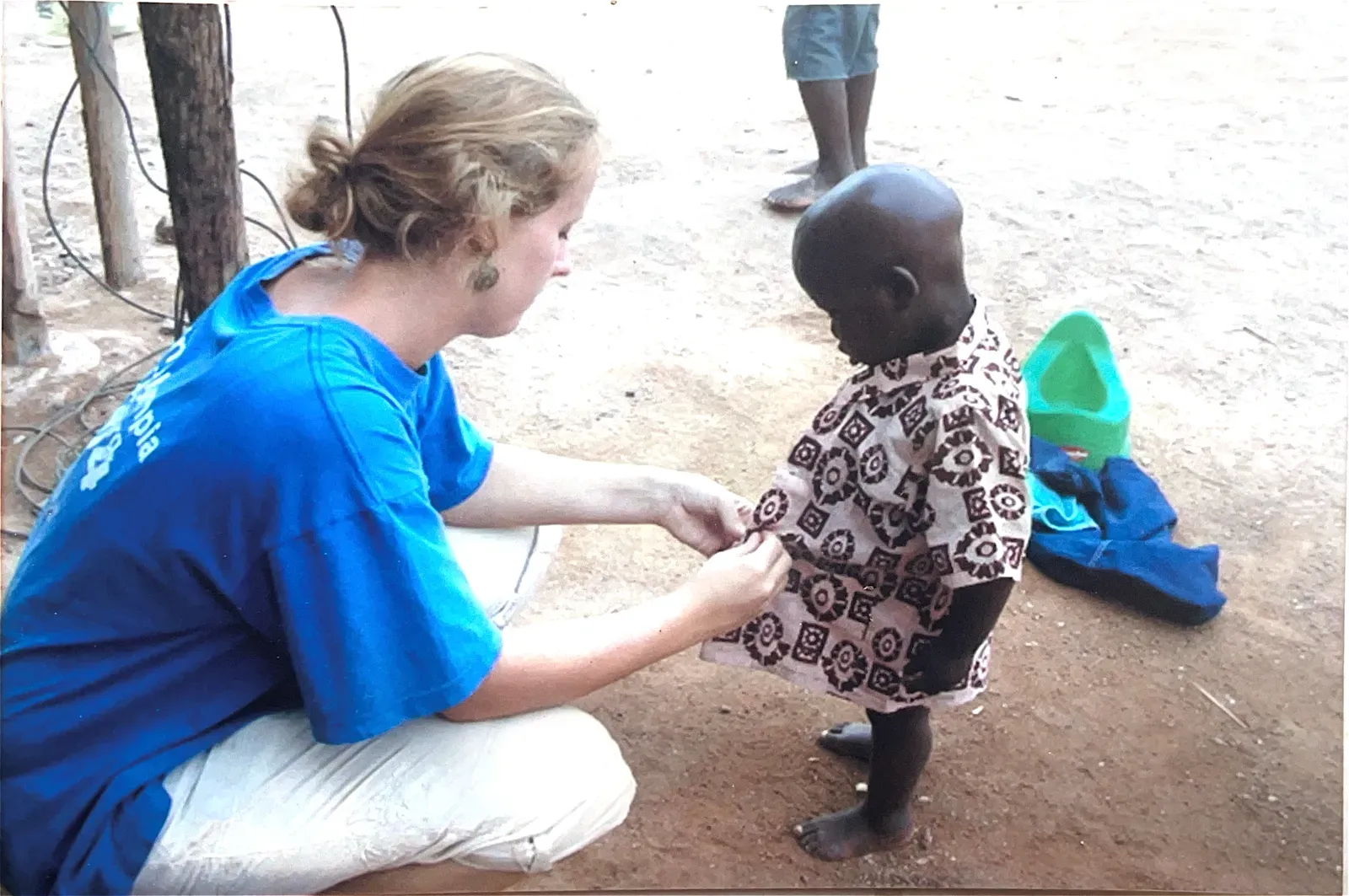 Volunteers and children at Watoto Wa Africa, from the home's earlier years