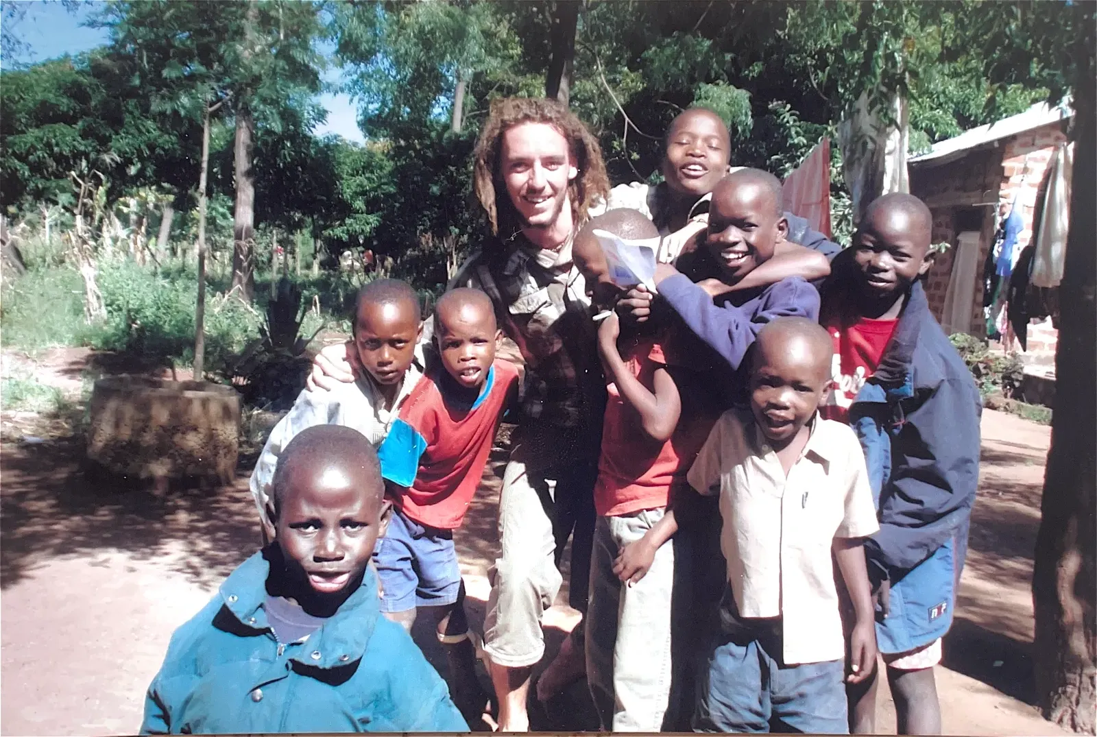 Volunteers and children at Watoto Wa Africa, from the home's earlier years