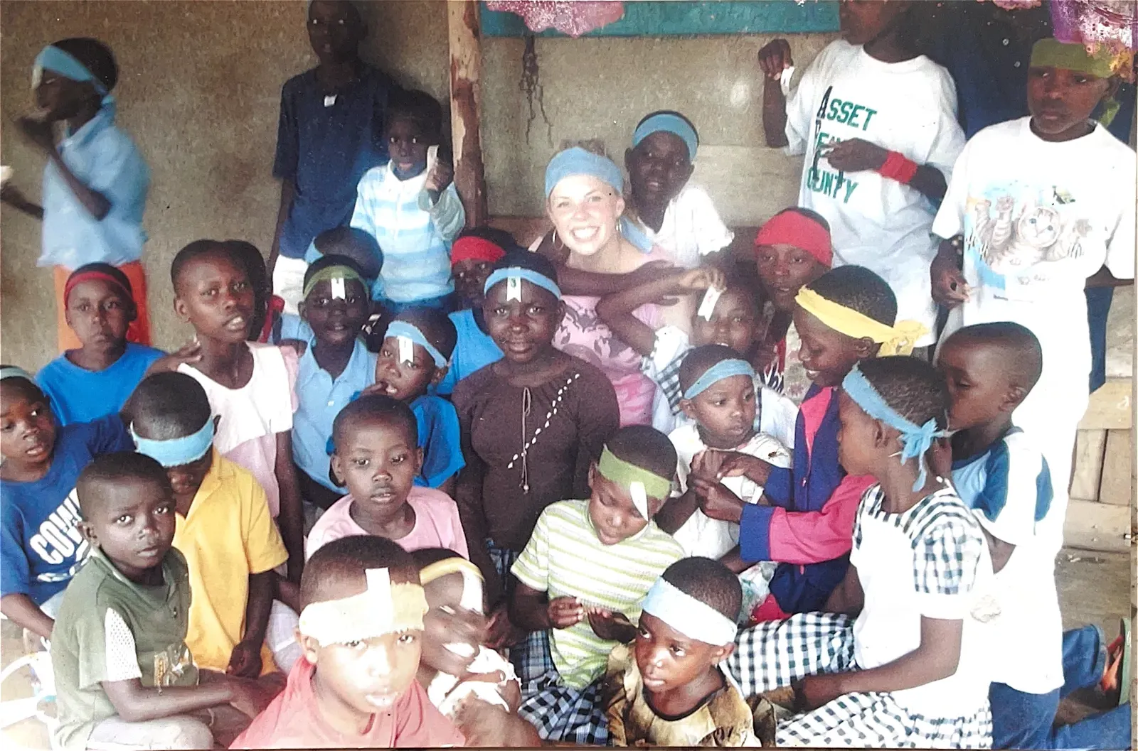 Volunteers and children at Watoto Wa Africa, from the home's earlier years