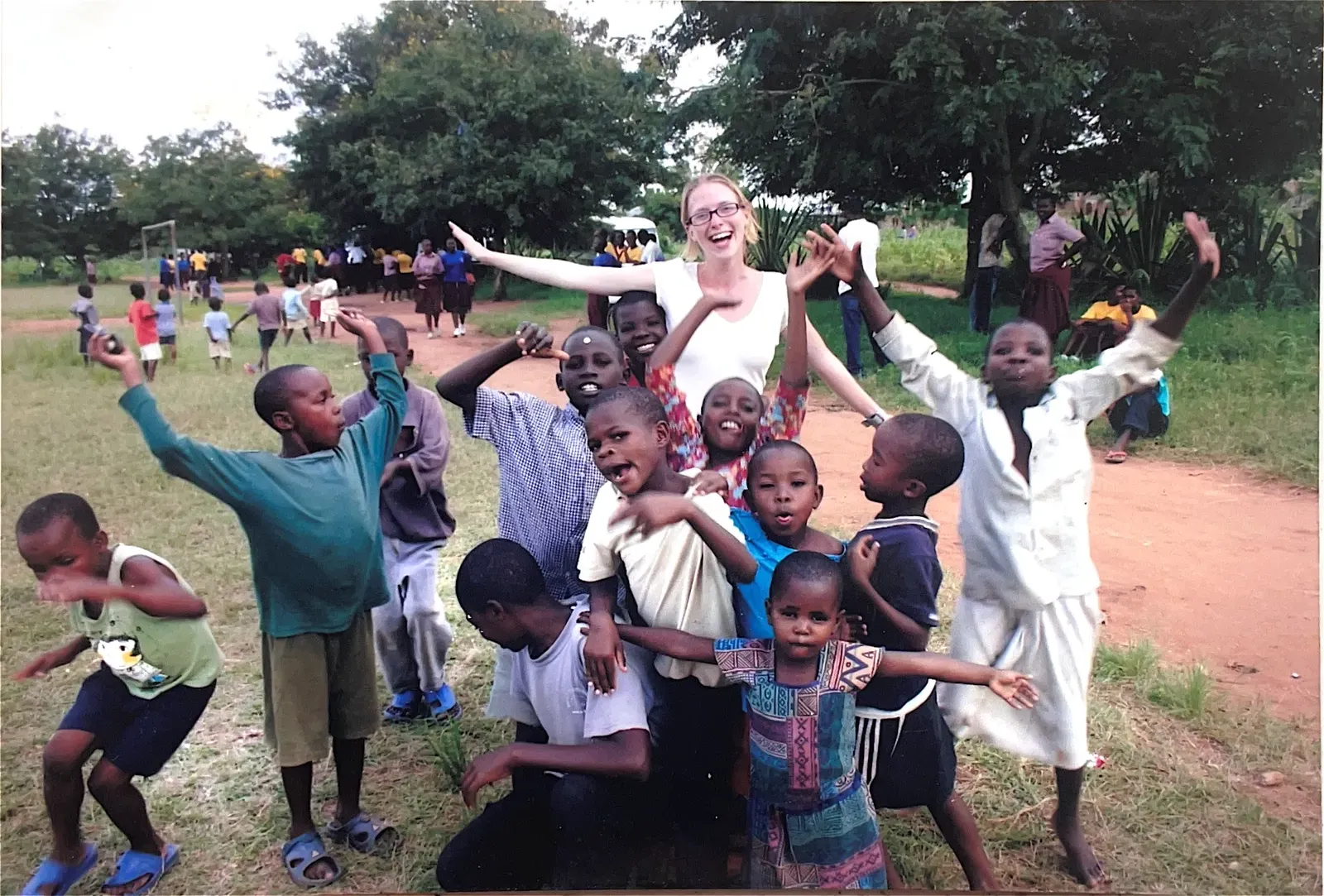 Volunteers and children at Watoto Wa Africa, from the home's earlier years