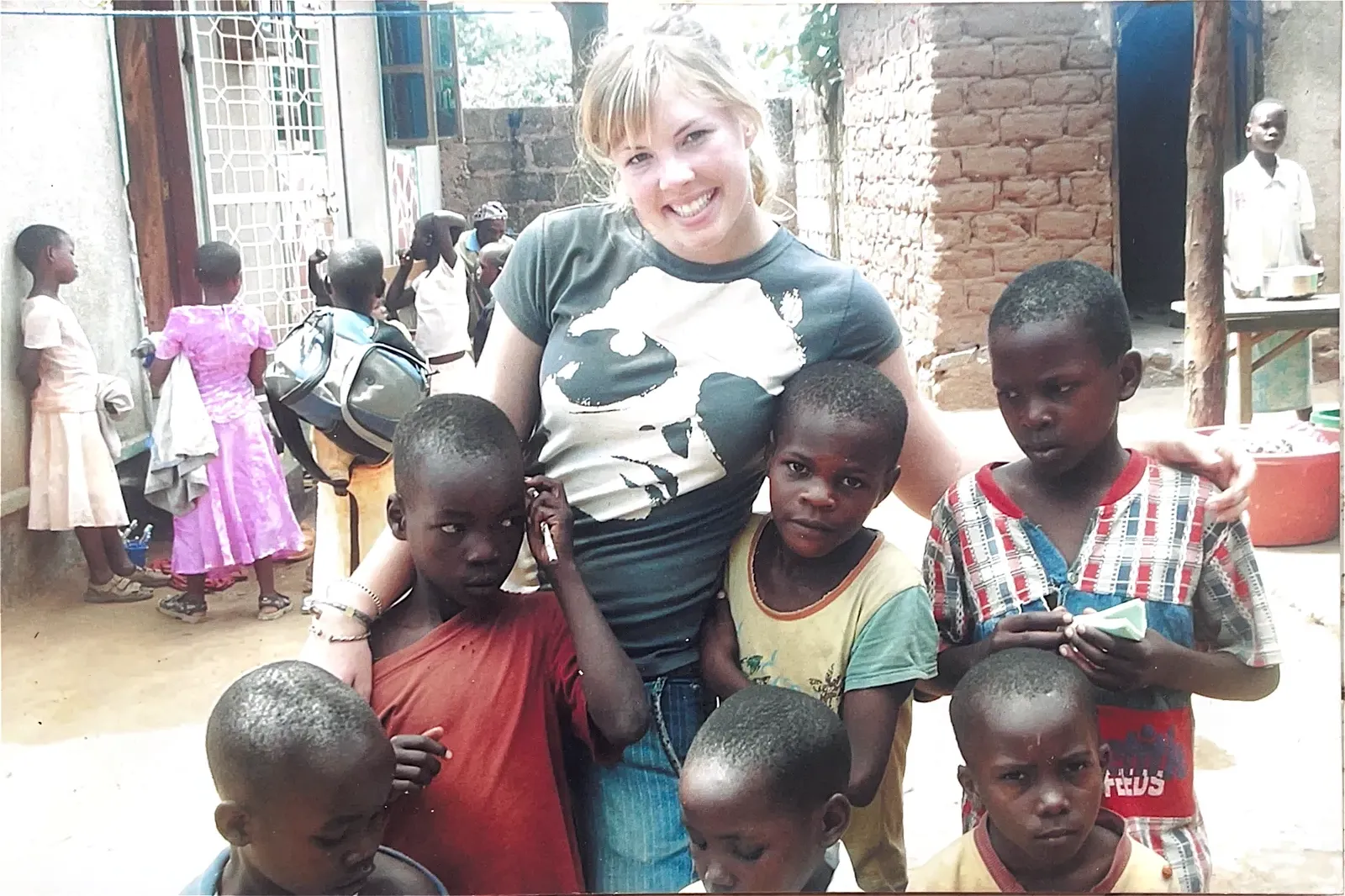 Volunteers and children at Watoto Wa Africa, from the home's earlier years
